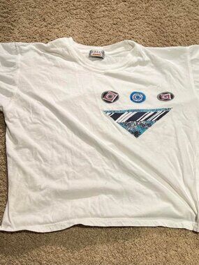 White Domani graphic tee with blue and black triangle design